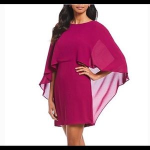 Caped cocktail dress